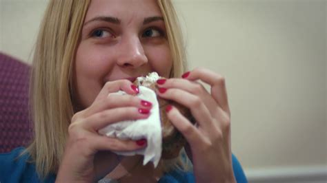 Young Woman Face Biting Tasty Sandwich During Lunch Close Up Portrait