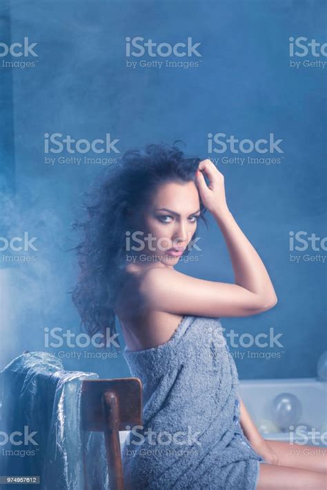 Beautiful Woman Relaxing In Towel Woman Taking A Bath In Steamy