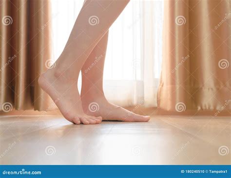 Woman Feet Legs On Wood Floor With Curtain Barefoot Girl Standing