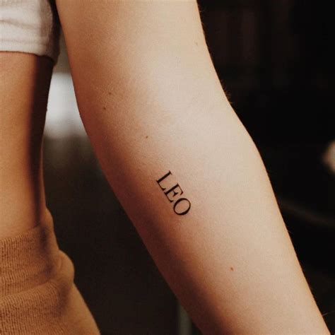 Leo Lettering Tattoo On The Inner Forearm