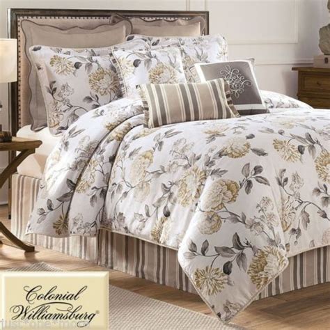 Do romantic vintage roses and pastel colored stripes. A Waverly Williamsburg Eve King comforter set, with a gold ...