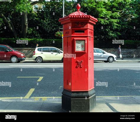 A Victorian Penfold Red Post Box On Kensington High Street England U