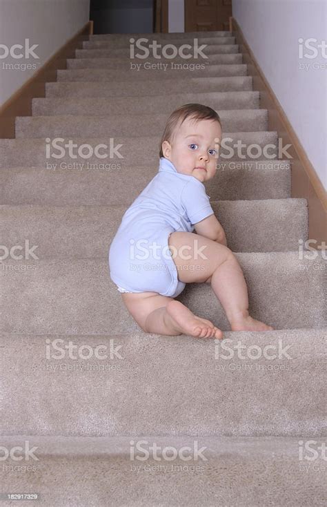 Child Crawling Up Stairs Stock Photo Download Image Now Baby