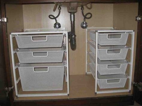 Take the time to clean the area out and utilize it. Under Cabinet Storage Solutions - Storage Designs
