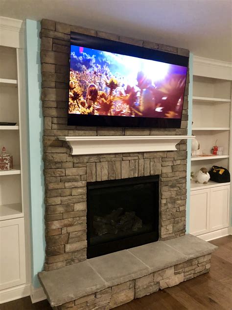 Rock Fireplace Tv Installation In Georgetown Ky • Lg 65” Oled