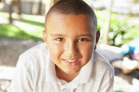 Smiling Mixed Race Boy Stock Photo Dissolve