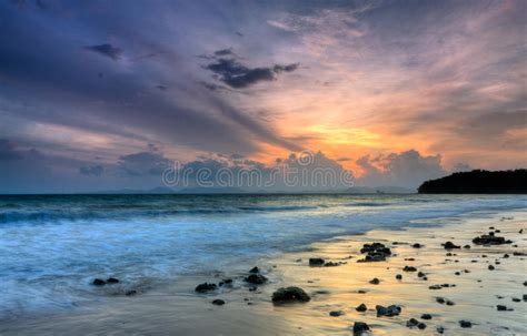 Romantic Sunset At A Rocky Beach Royalty Free Stock Photography Image