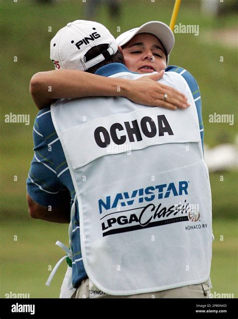 Lorena Ochoa Of Mexico Hugs Her Caddie Greg Johnston After Winning The Navistar Lpga Classic