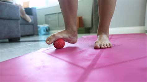 Woman Massages The Foot With A Ball Close View Stock Footage Video
