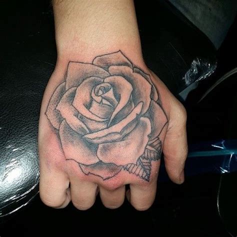 The art of making tattoos is tattooing. Rose on Hand Tattoo Idea | Best Tattoo design ideas | Rose tattoos for men, Rose hand tattoo ...