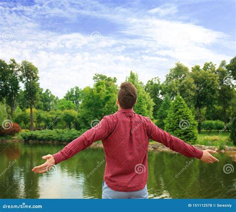 Young Man Enjoying The Fresh Air Outdoors Stock Photo Image Of