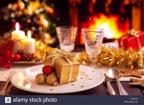 Fox likes tables of six to eight for generating the best conversations, where everyone gets involved. A romantic Christmas dinner table setting with candles and ...