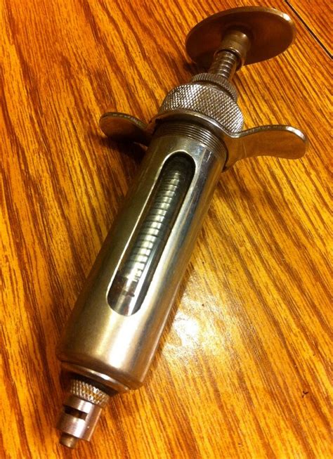 Vintage Medical Syringe