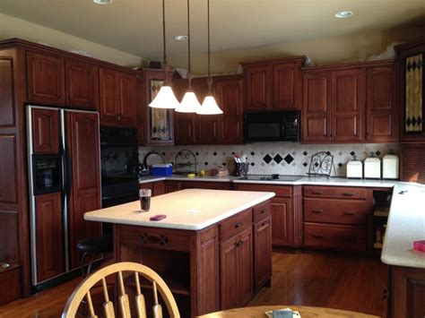 Staining wood cabinets gives you. Furniture & Appliances: Stylish Restaining Oak Cabinets ...