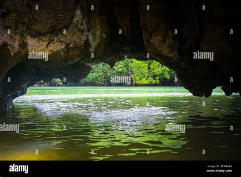 Caves In Limestone Cliffs Phang Nga Bay Thailand Stock Photo Alamy