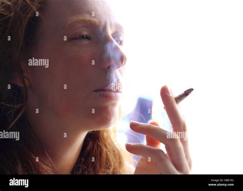 Female Smoker Woman With Cigarette Beathing Smoke Stock Photo Alamy