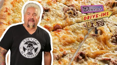 guy fieri eats a steak and cola pizza diners drive ins and dives food network youtube