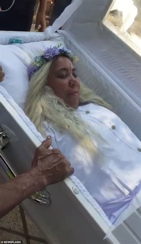 Woman Rehearses For Own Funeral By Lying In A Coffin For Hours In Bizarre Dominican Republic