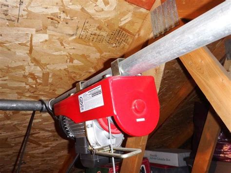 Make sure it's strong and sturdy so it can withstand all the weight you'll be putting on it. Garage Attic Electric Hoist in 2020 | Garage hoist, Garage ...
