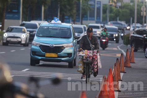Foto: Wajah Pedagang Kopi Keliling di Jakarta