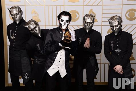 photo papa emeritus iii with ghost wins award at the 58th annual grammy awards in los angeles