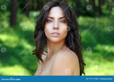 Beautiful Brunette Woman With Perfect Skin Outdoor Spring Portrait On Nature Background Stock