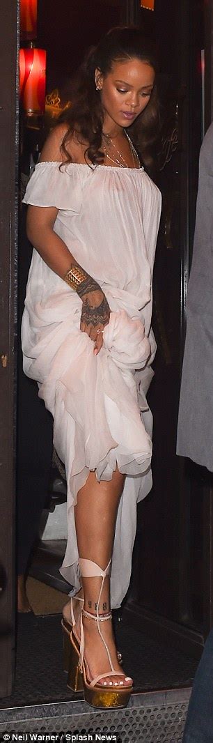 Rihanna Goes Braless In Sheer Dress At Vogues Paris Fashion Week Party Daily Mail Online
