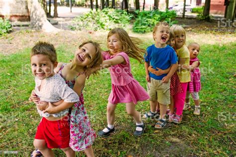 Cute Children Playing At Park Stock Photo & More Pictures of 2-3 Years ...