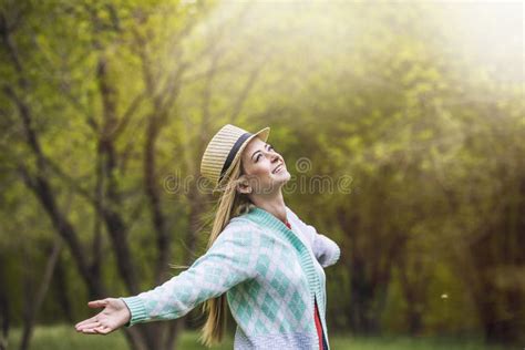 Woman Beautiful Sunshine Happy And Smiling Enjoying The Warmth Stock