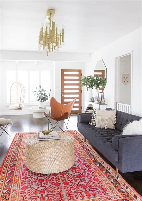 The most common layout is to select a rug large enough that you can place the front legs of any chairs, sofas and side tables. 20 Breathtaking Mid-Century Modern Living Room Ideas