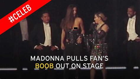 Madonna Shocks As She Pulls Down A Female Fans Top To Reveal Her Bare Breast On Stage Mirror