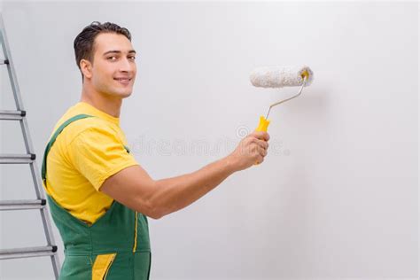 The Man Painting The Wall In Diy Concept Stock Photo Image Of