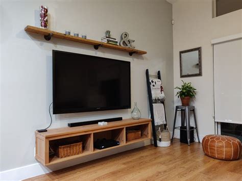 Wall Mounted Tv Floating Entertainment Unit And Wood Shelf Above The
