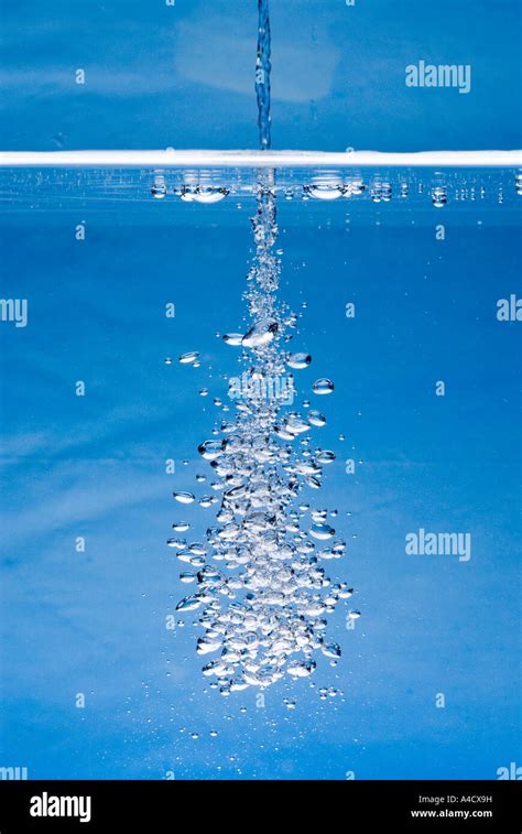 Water Jet Produces Many Air Bubbles Stock Photo Alamy