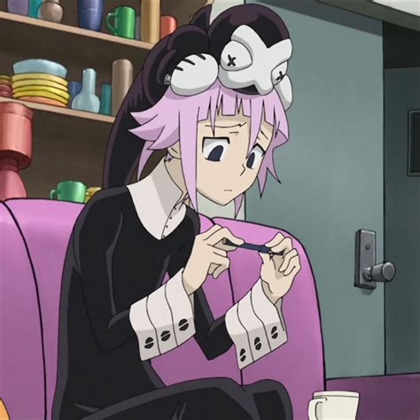 An Anime Character Sitting On A Couch In Front Of A Coffee Cup And