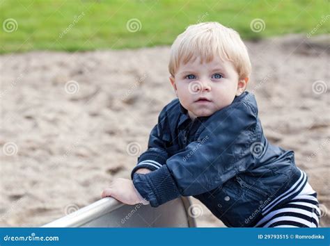 Little Toddler Boy Sitting On Playground Stock Image Image Of Sweet