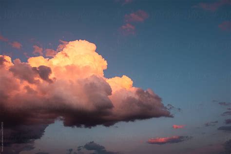 Cumulus Clouds At Sunset By Stocksy Contributor Vera Lair