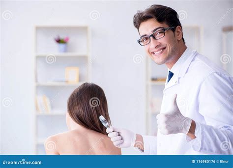 The Doctor Examining The Skin Of Female Patient Stock Photo Image Of