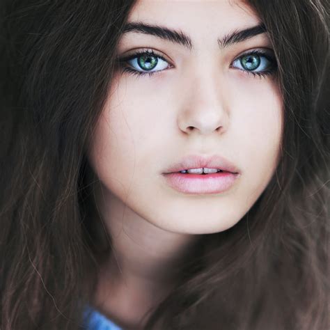 Blue Eyes Portrait Of A Beautiful Girl With Blue Eyes Black Hair