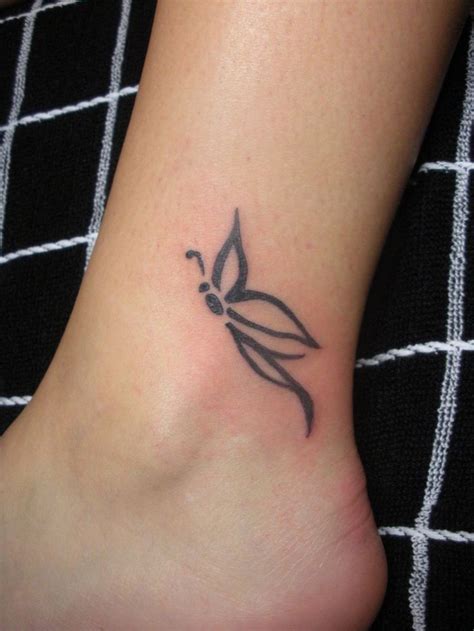 Wrist tattoos are extremely popular and people can never seem to get enough of them. Cute butterfly simple foot tattoo - Tattooimages.biz