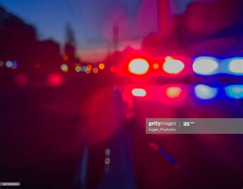 Red And Blue Lights Of Police Car In Night Time Night Patrolling The