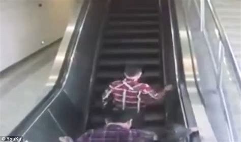 Commuters Fall On Escalator In A Chinese Subway Station Daily Mail Online