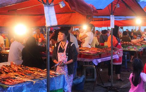 If you book with tripadvisor, you can cancel up to 24 hours before your tour starts for a full refund. Night market in Kota Kinabalu, food, people and taste