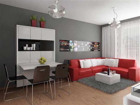 Wood and metal accessories and wood floor shine in this layout. Gray Living Room for Minimalist Concept - Amaza Design