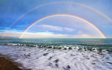 Foto Dubbele Regenboog Boven Zee Achtergronden