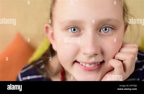 Teenage Big Blue Eyed Blonde Girl Facial Expression Close Up