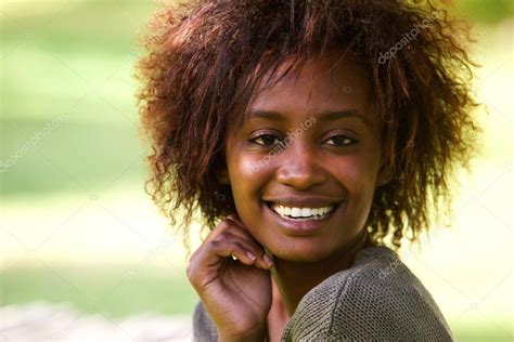 Beautiful Black Woman Smiling — Stock Photo © Mimagephotos 101684948