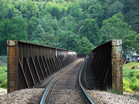 Csx North South Mainline Crosses A Curved Steel Deck Railroad Bridge