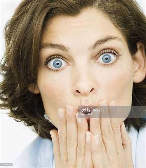 Woman Making Surprised Face High Res Stock Photo Getty Images