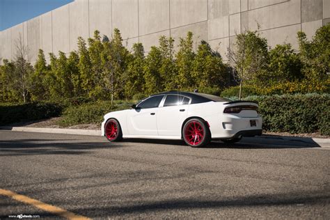 Stylish Warrior White Dodge Charger With Black Roof And Red Wheels